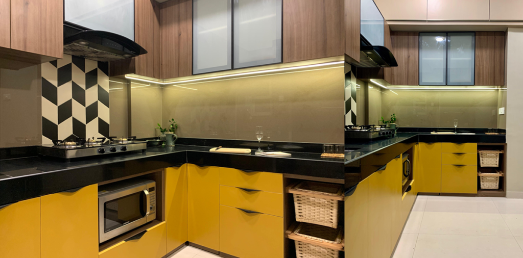 Compact kitchen in 2BHK apartment with storage cabinets and loft